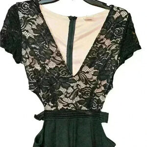Monaco Lace Jumpsuit. Black V- Neck Low Cut
